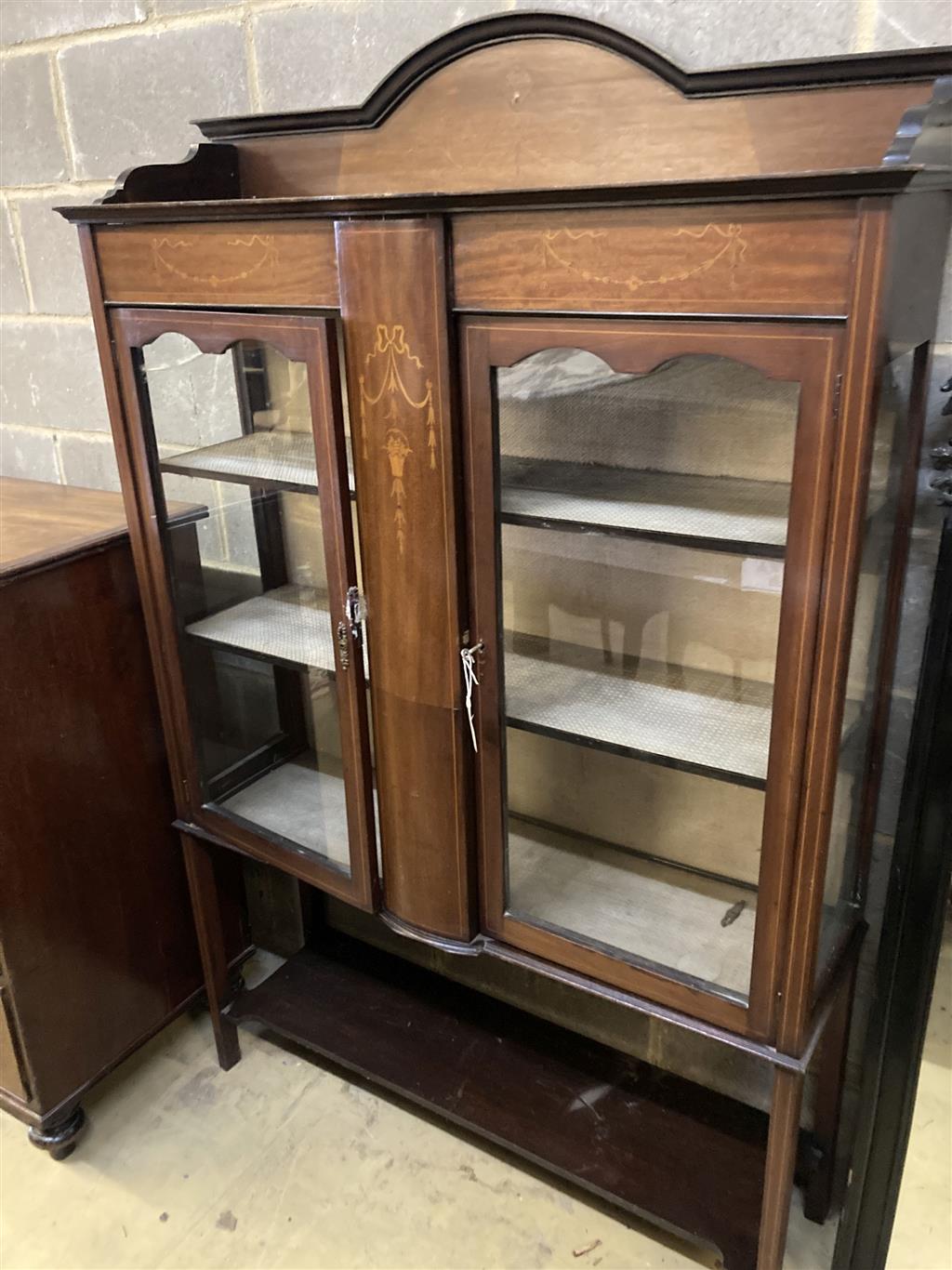 An Edwardian inlaid mahogany display cabinet, width 120cm, depth 35cm, height 175cm